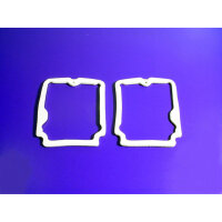 Tail-light Lens Gaskets.  Made of white sponge.  Pair