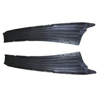Running board covers. These dense black rubber covers are...